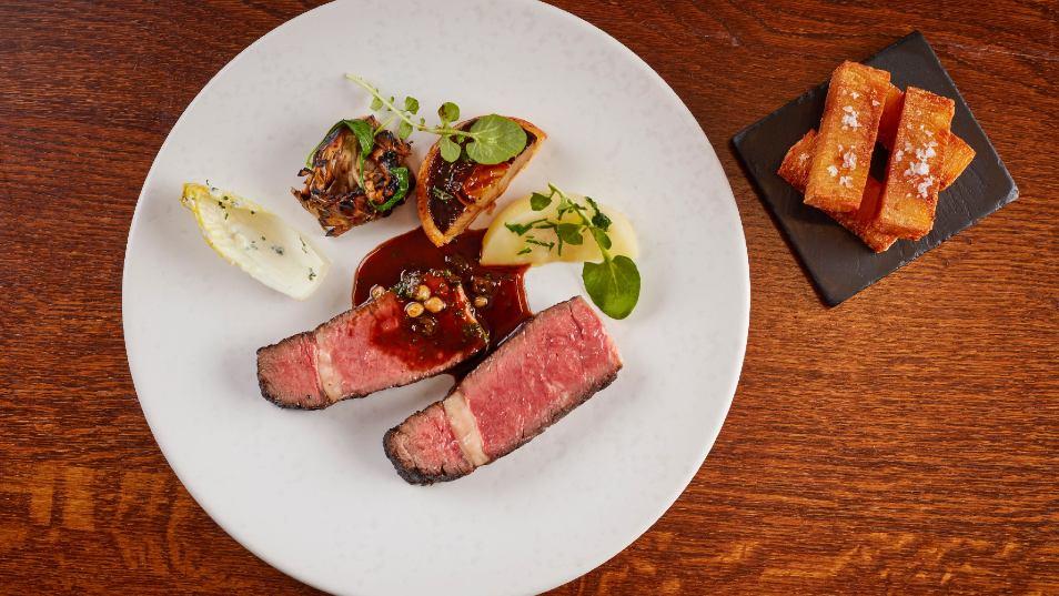 Charcoal grilled grass-fed Irish rib-eye with a stout and pickled walnut Bordelaise sauce