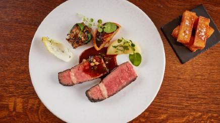 Charcoal grilled grass-fed Irish rib-eye with a stout and pickled walnut Bordelaise sauce